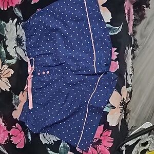 Pj bottoms in a dark blue with pastel colored  dots.Pink silk tie